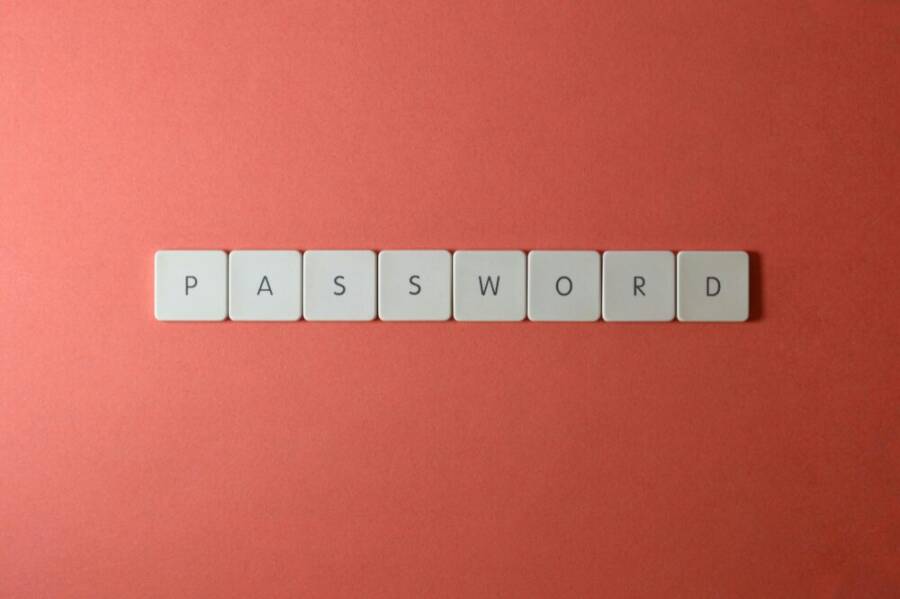 Focus on password security with white keyboard tiles spelling
