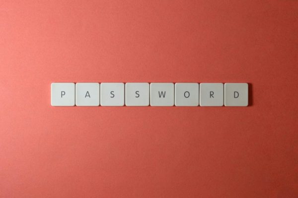 Focus on password security with white keyboard tiles spelling