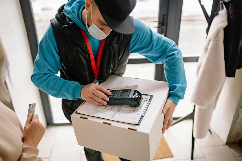 Delivery worker handling package