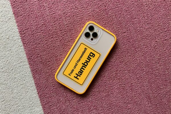 Smartphone with vibrant yellow case displaying