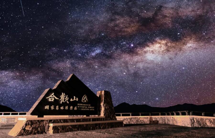 A captivating view of the Milky Way over Hehuanshan monument and national forest recreation area at night