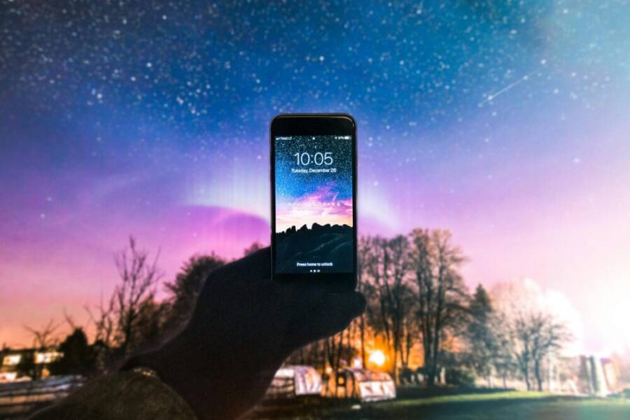 A smartphone displaying the night sky
