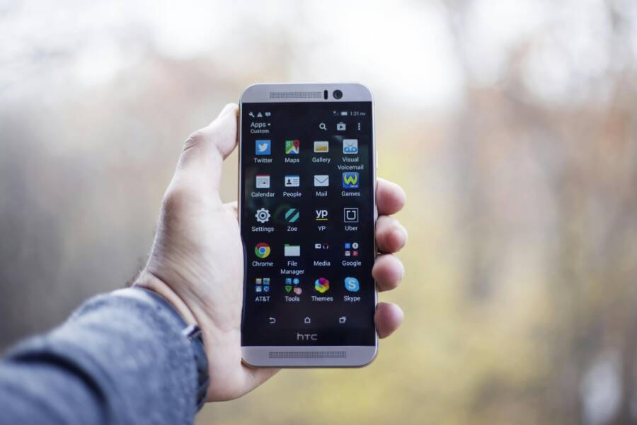 A close-up of a hand holding a smartphone
